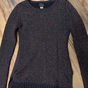 Simply styled petite size sweater. Shimmery knit